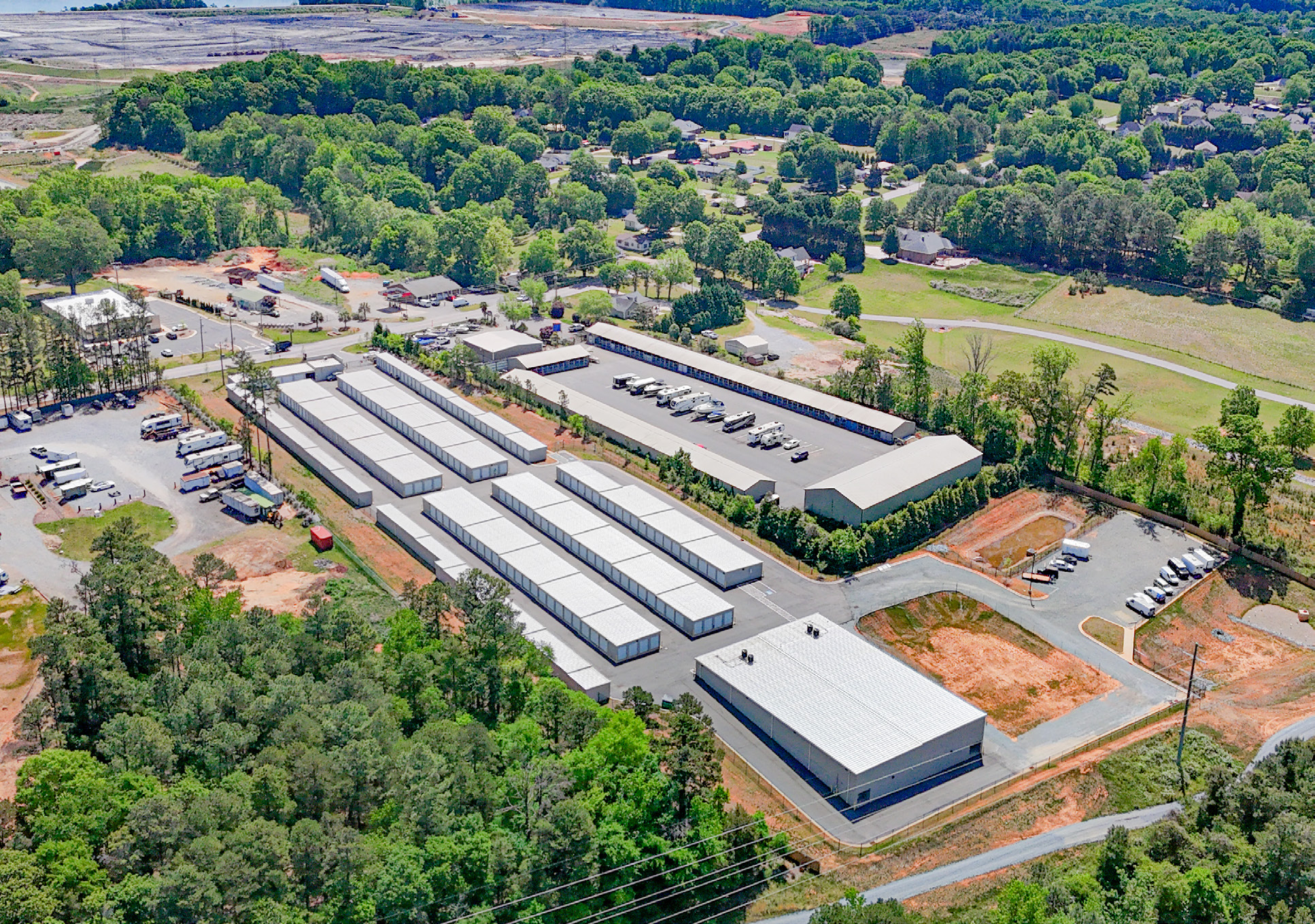 Aerial overview of the CubeSmart Belmont site and surroundings